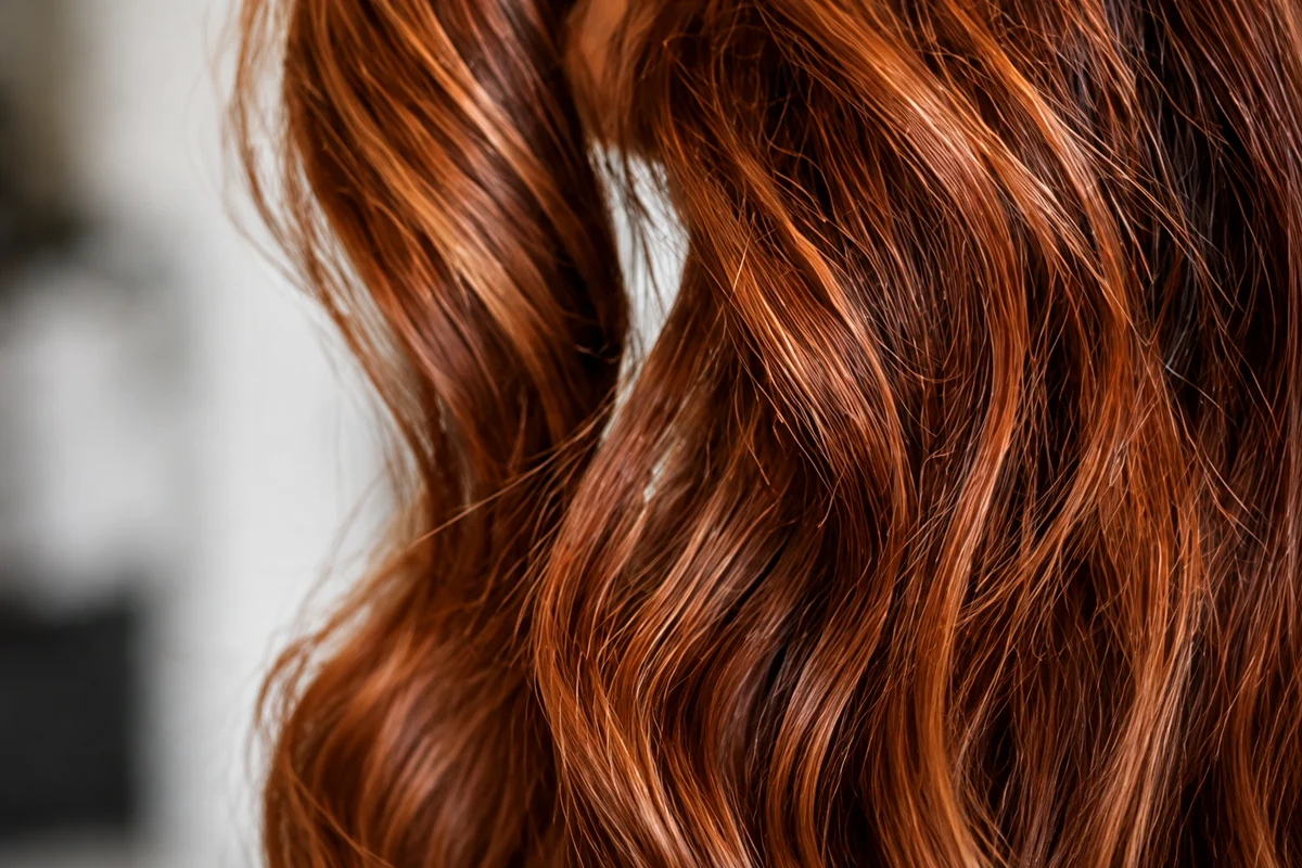 Illustrative luminous copper hair detail